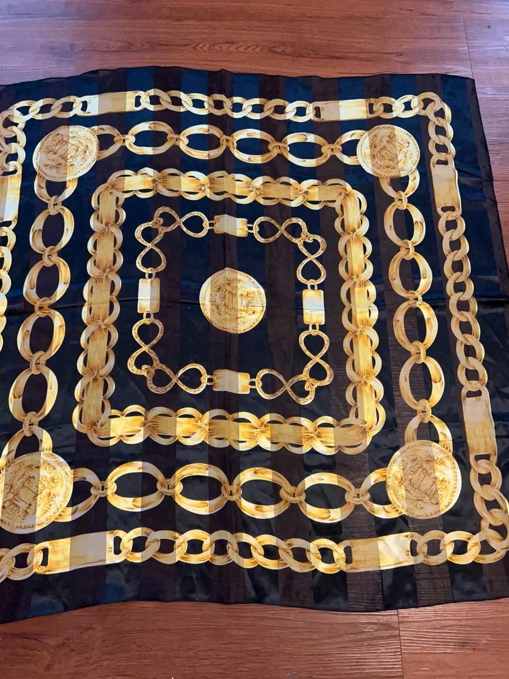 Black Silk-Look Scarf with Bold Gold Chain Print